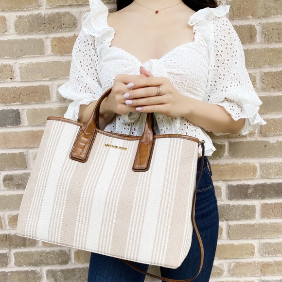 Michael Kors Handbags - Gaby’sBags👜💕-NWT Michael Kors Tote Stripe cream